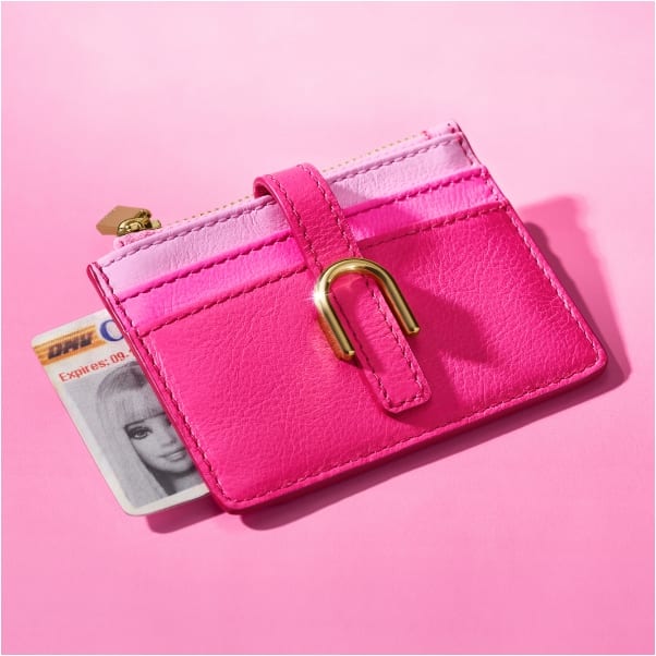 The Barbie™x Fossil pink leather card case.  